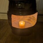 upcycled Beer barrel coffee table with a candle in