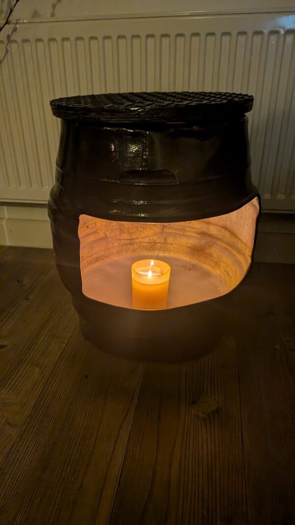 upcycled Beer barrel coffee table with a candle in