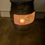 upcycled Beer barrel coffee table with a candle in