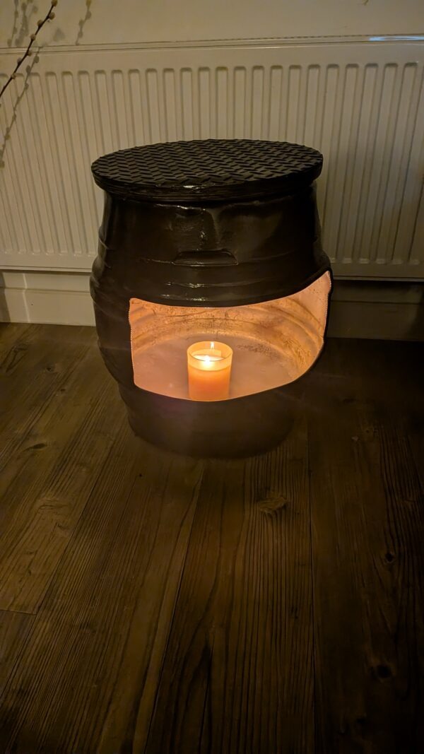 upcycled Beer barrel coffee table with a candle in