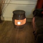 upcycled Beer barrel coffee table with a candle in