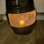 upcycled Beer barrel coffee table with a candle in