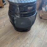upcycled Beer barrel coffee table with a candle in