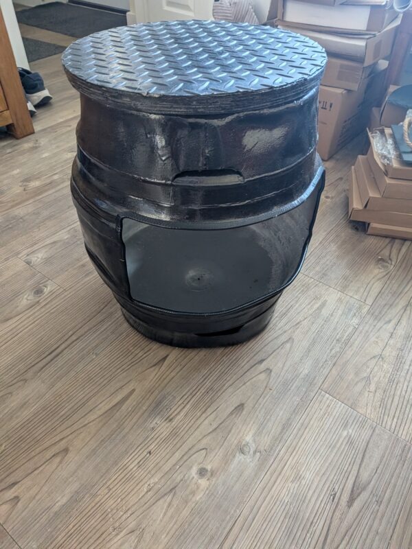 upcycled Beer barrel coffee table with a candle in