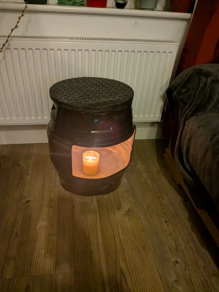 upcycled Beer barrel coffee table with a candle in