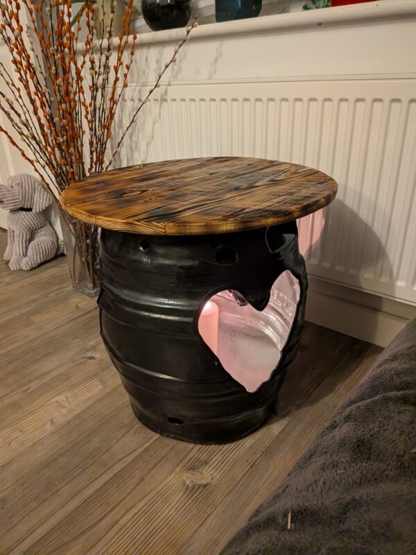 Upcycled beer barrel heart table illuminated from inside