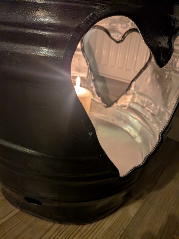 Upcycled beer barrel heart table illuminated from inside