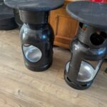 Upcycled gas cylinder coffee table with scorched timber top