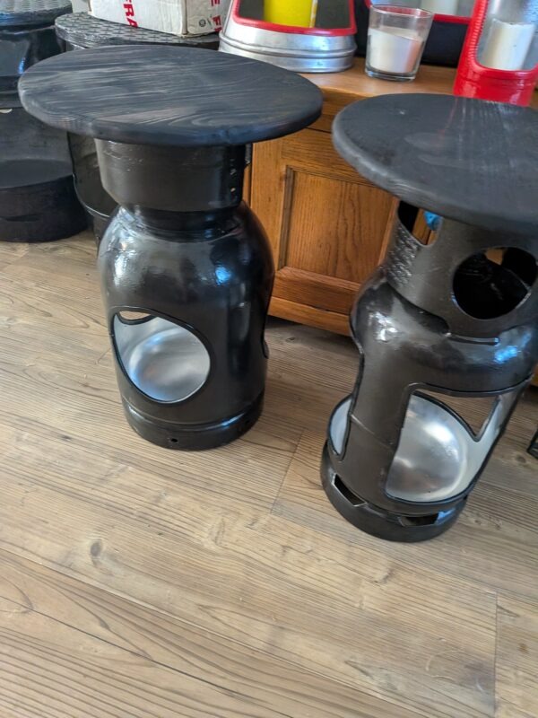 Upcycled gas cylinder coffee table with scorched timber top