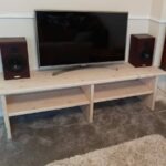 Handmade scaffold board TV unit with television and storage shelves