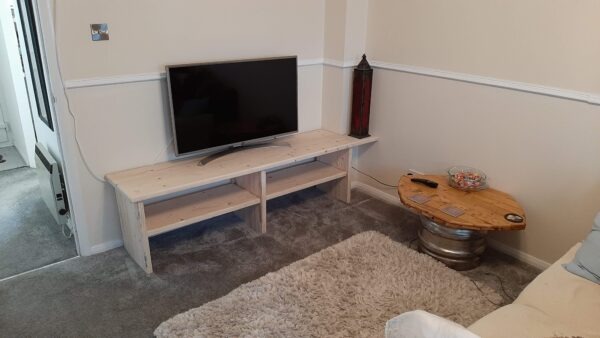 Handmade scaffold board TV unit with television and storage shelves