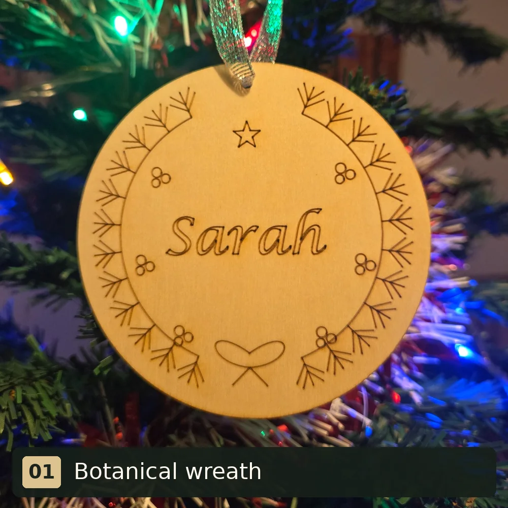 Botanical wreath personalised wooden Christmas tree decoration engraved with Sarah
