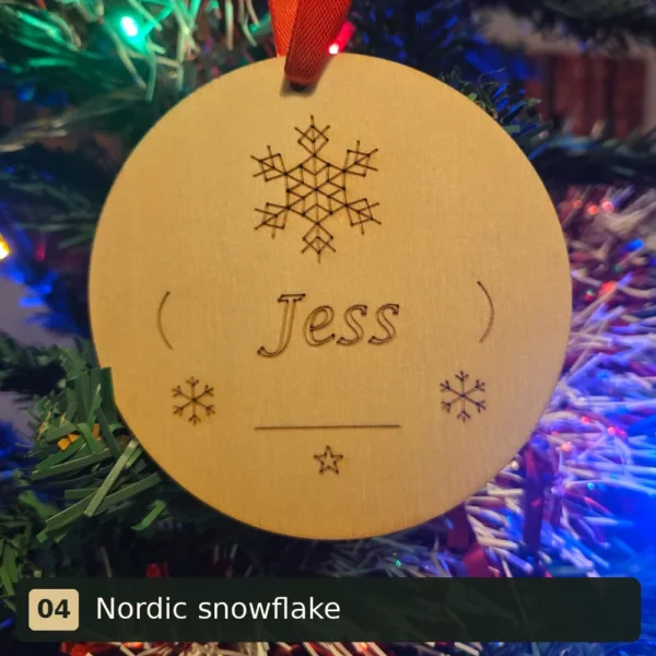 Nordic snowflake personalised wooden Christmas tree decoration engraved with Jess