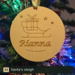 Santa's sleigh personalised wooden Christmas tree decoration engraved with Rianna
